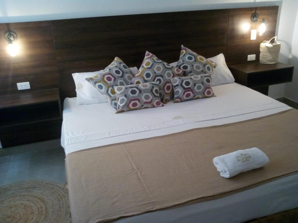 Postel nebo postele na pokoji v ubytování Hotel Viena