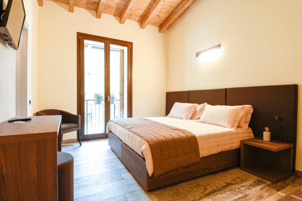 Säng eller sängar i ett rum på Agriturismo Ippolita Lucchetti