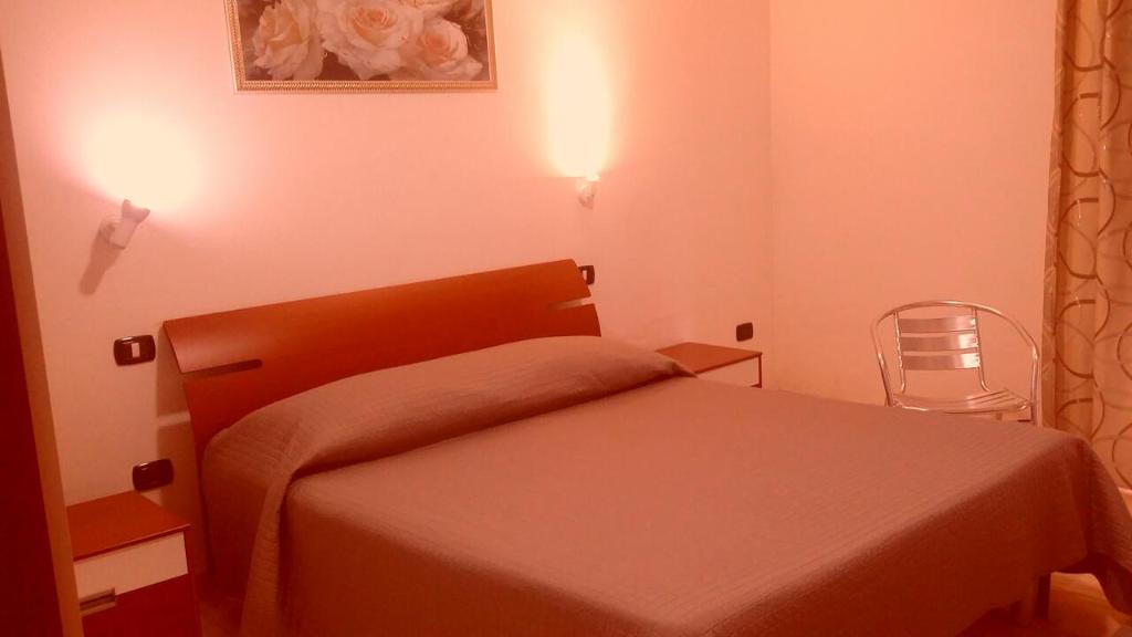 Cama o camas de una habitación en Sicily Guest House