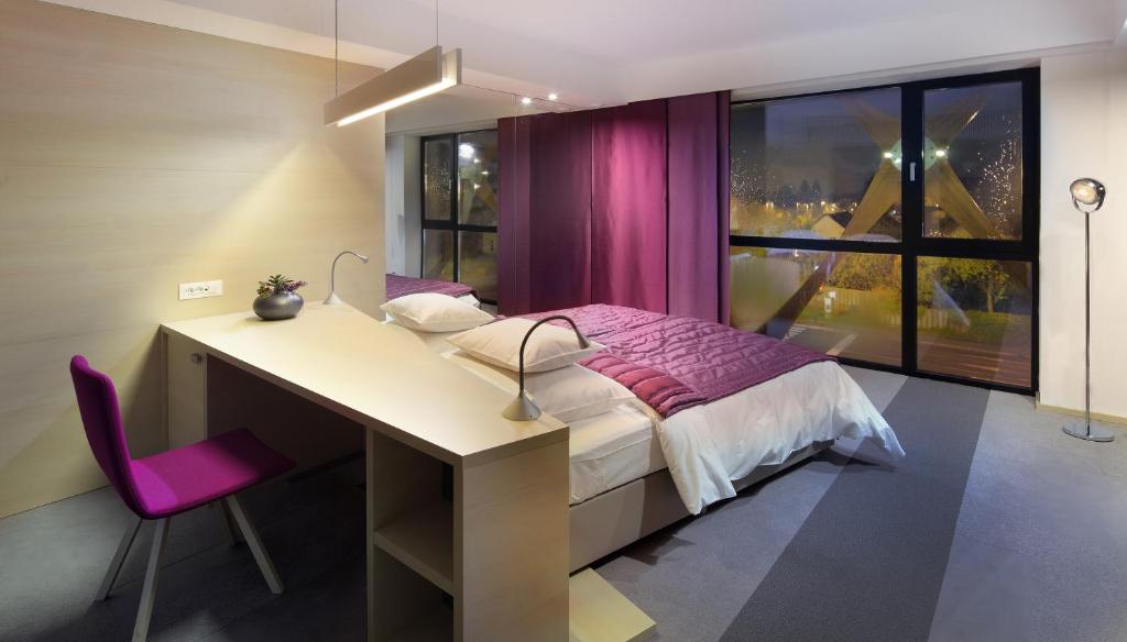 Postelja oz. postelje v sobi nastanitve Hotel Nox