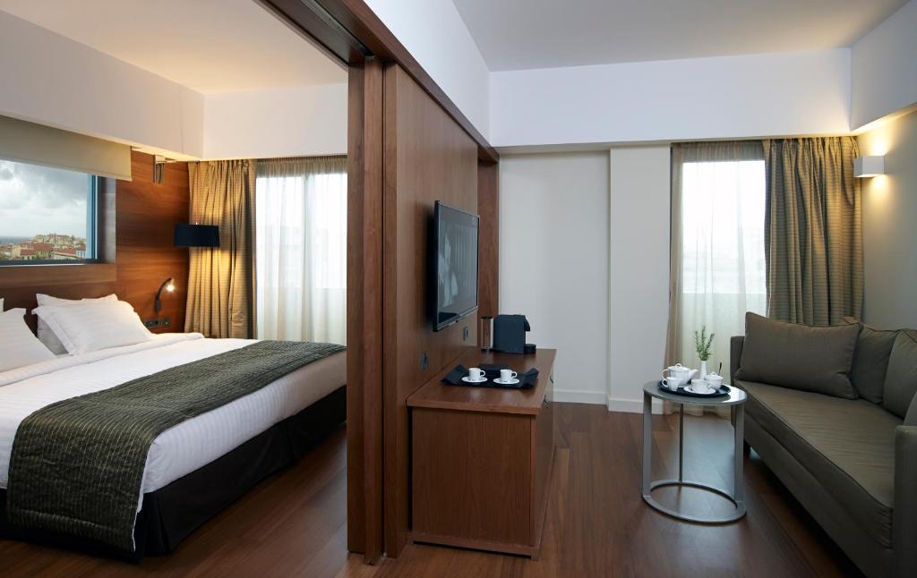 Postel nebo postele na pokoji v ubytování Samaria Hotel