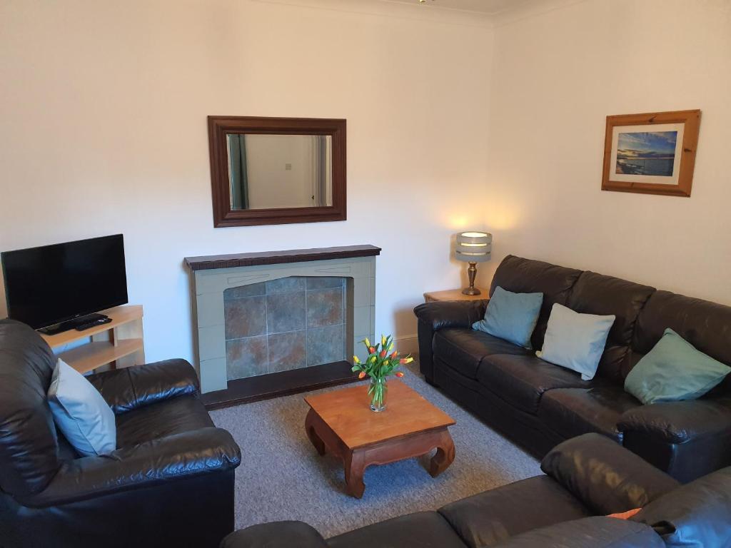 TV a/nebo společenská místnost v ubytování Summerhill Apartments