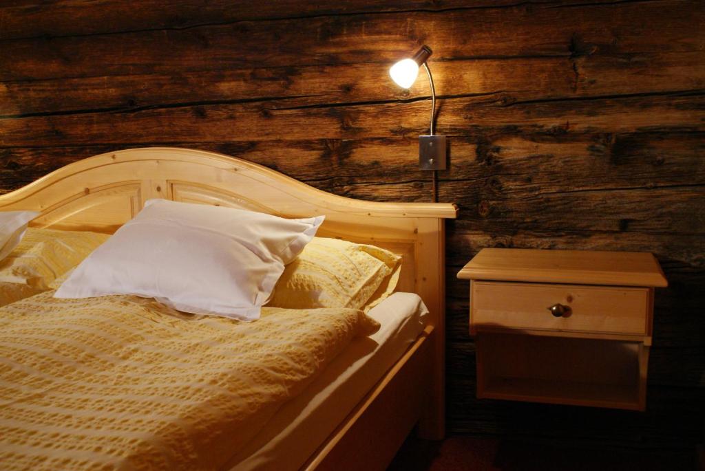 Postel nebo postele na pokoji v ubytování Haus Gstüat
