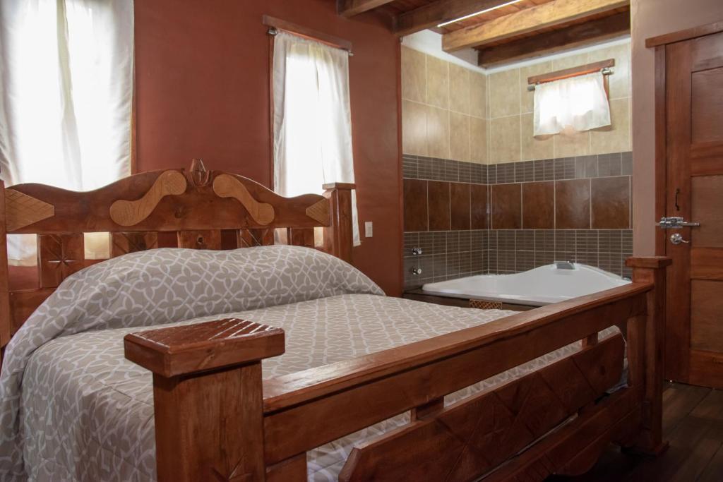 Postel nebo postele na pokoji v ubytování Cabaña Ensueño