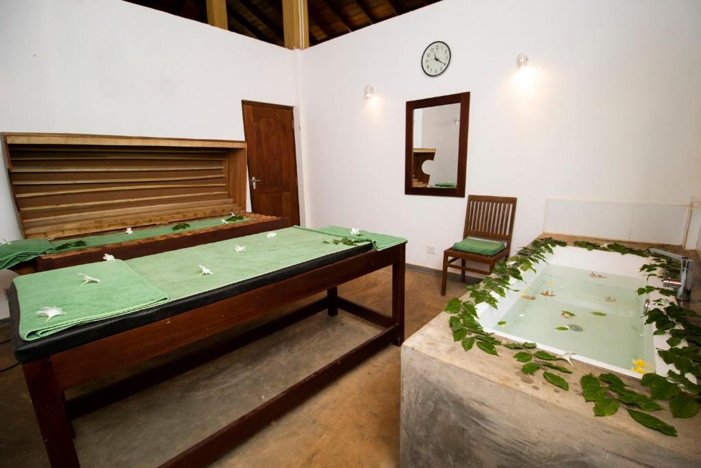 Postel nebo postele na pokoji v ubytování Amaara Forest Hotel Sigiriya