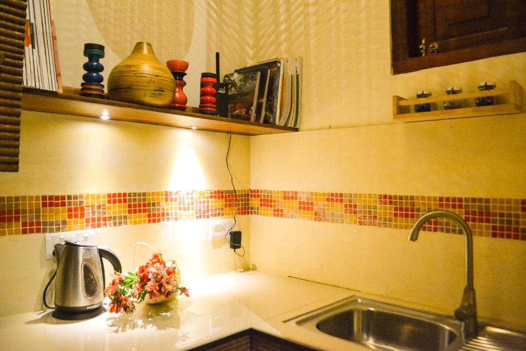 Kuchyň nebo kuchyňský kout v ubytování Urban Bliss Studio