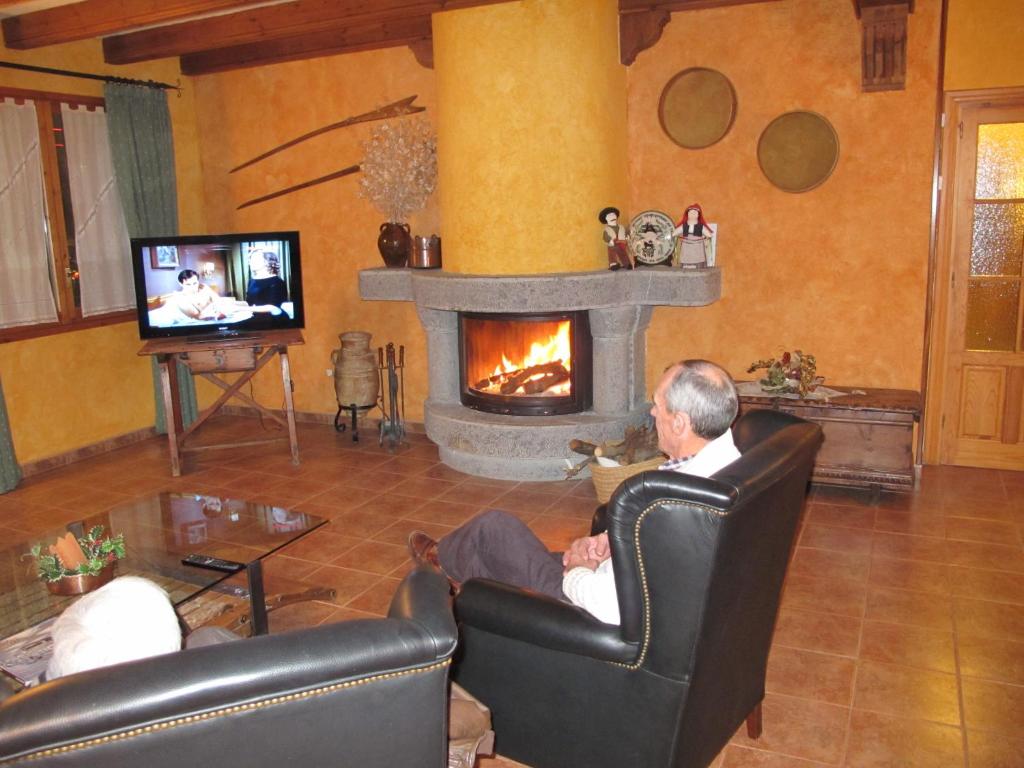 TV a/nebo společenská místnost v ubytování Hotel Turmo