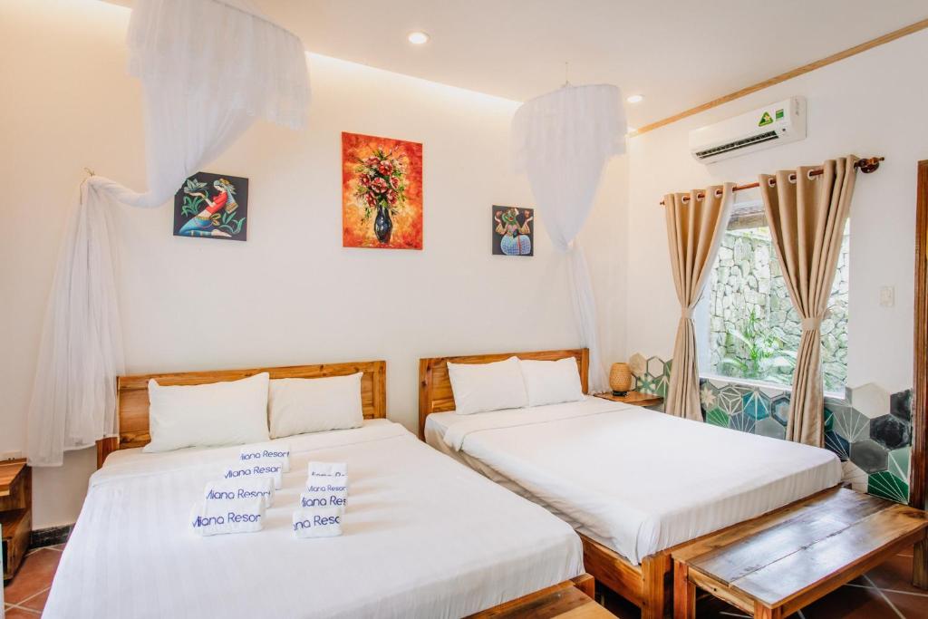 Postel nebo postele na pokoji v ubytování Miana Resort Phu Quoc