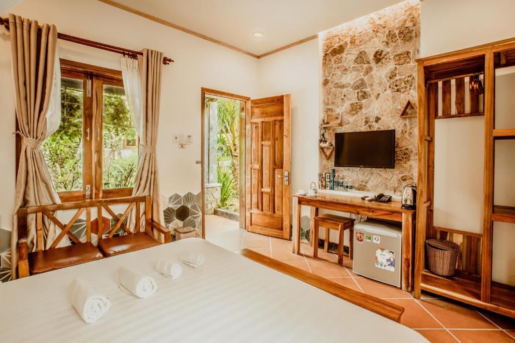 TV a/nebo společenská místnost v ubytování Miana Resort Phu Quoc