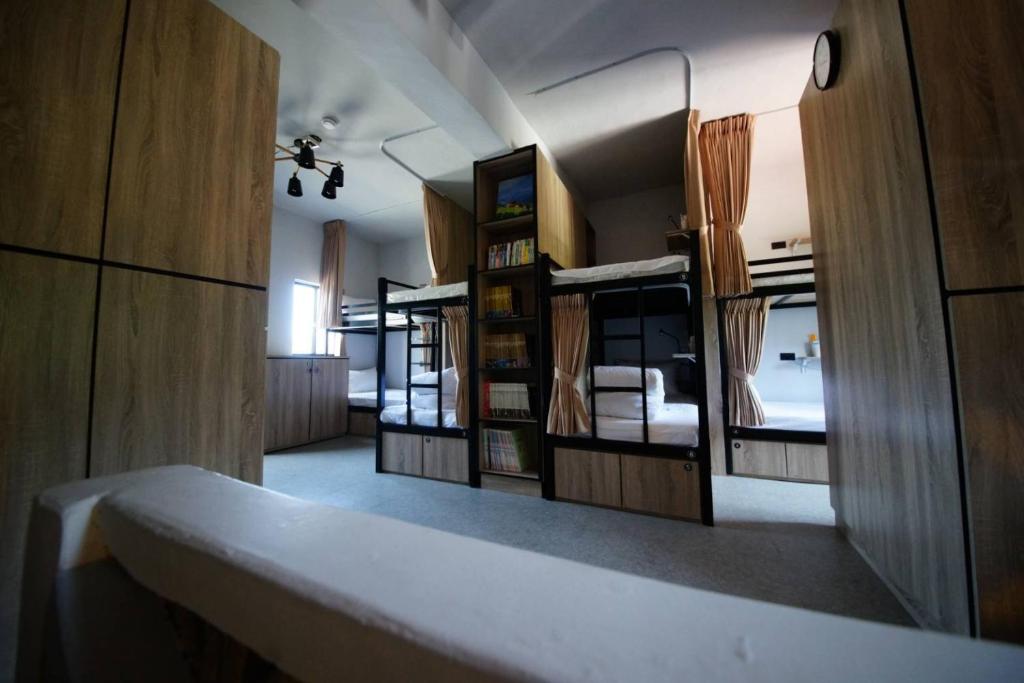 Postel nebo postele na pokoji v ubytování Yes, Sir Homestay 2