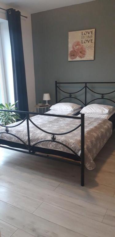 Postel nebo postele na pokoji v ubytování Azalia 32 Mielno l