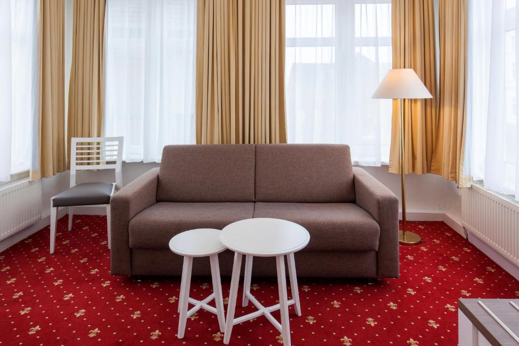 Posezení v ubytování Hotel Weisse Düne