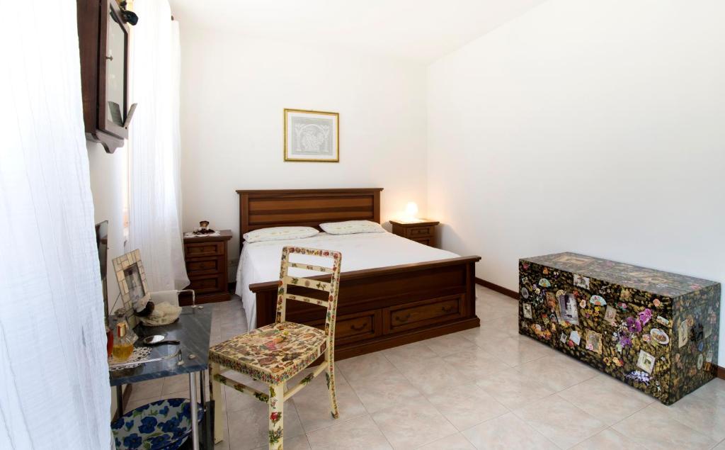 Postel nebo postele na pokoji v ubytování B&B VILLA GINEVRA