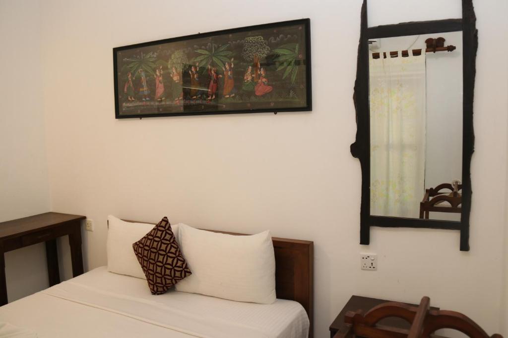 Postel nebo postele na pokoji v ubytování Thal Sewana Home Stay