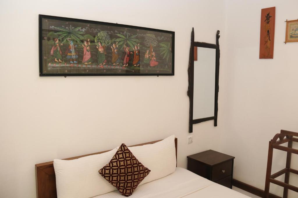 Postel nebo postele na pokoji v ubytování Thal Sewana Home Stay
