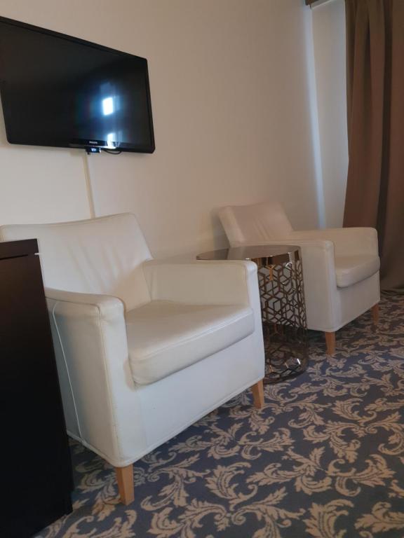 Posezení v ubytování Ariston Hotell