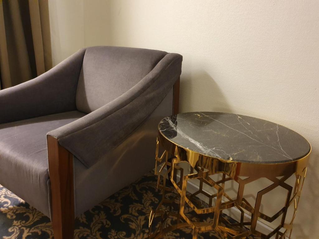 Posezení v ubytování Ariston Hotell