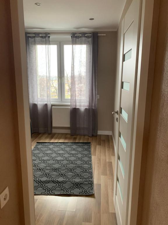 Posedenie v ubytovaní Apartament „Ogrodowa”