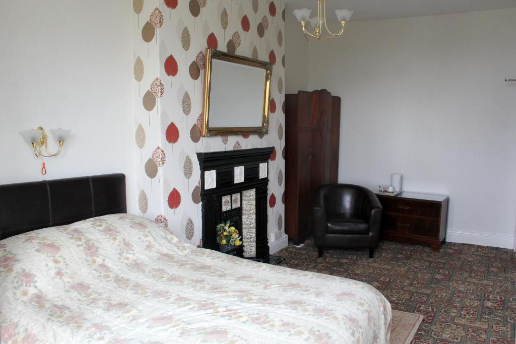 Postel nebo postele na pokoji v ubytování Ashfield Guesthouse