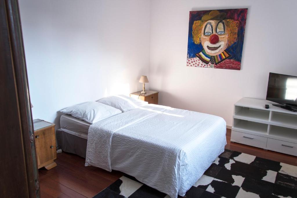 Un pat sau paturi într-o cameră la LA TERRASSE SELESTADIENNE
