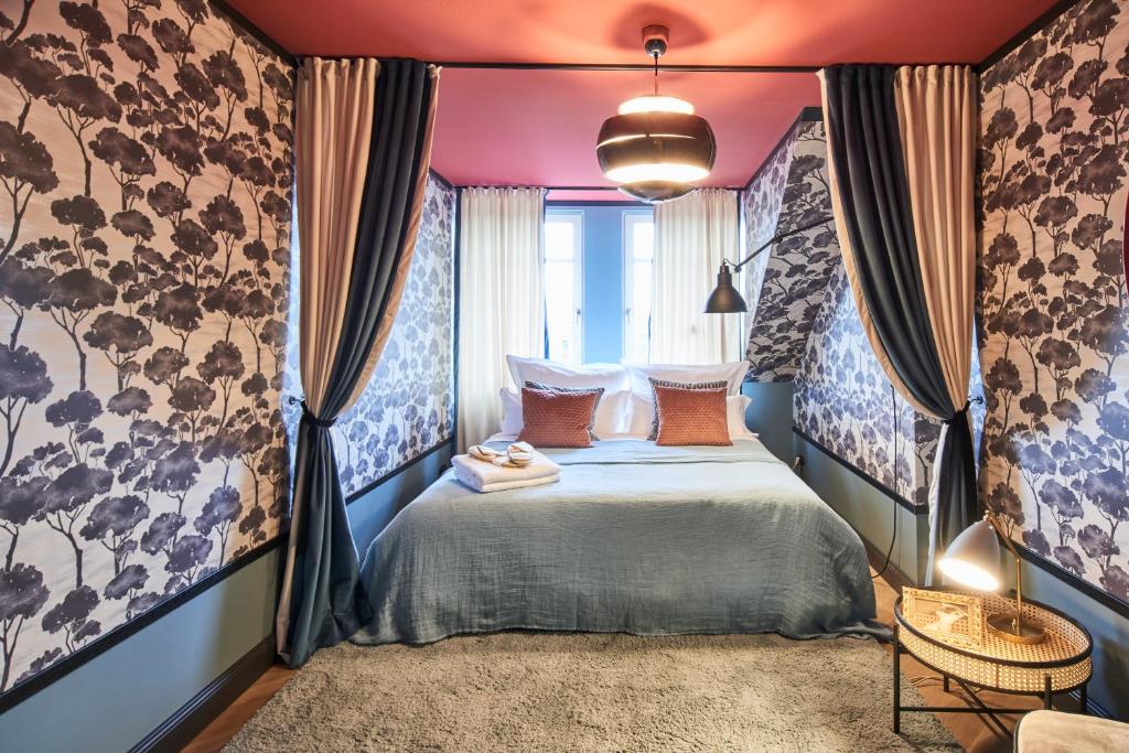 Postel nebo postele na pokoji v ubytování Cora Apartments