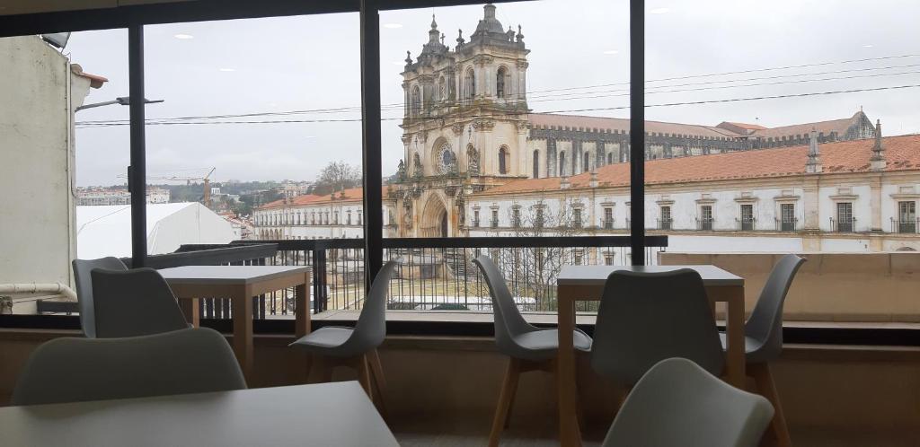 Um restaurante ou outro lugar para comer em Hotel Santa Maria