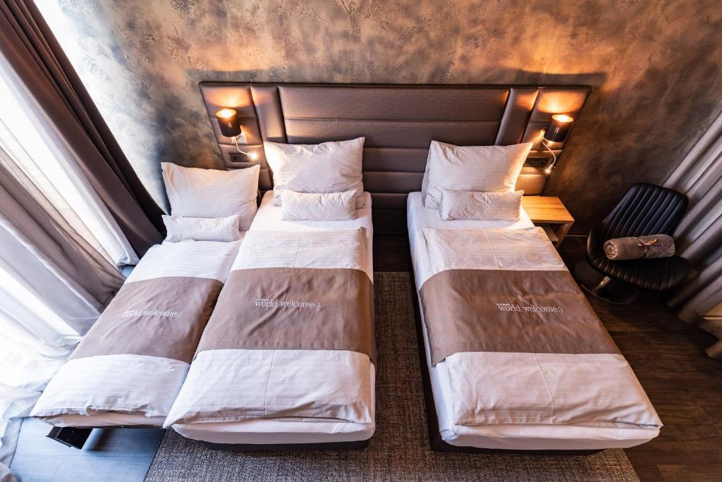 Cama o camas de una habitación en NUTREND World
