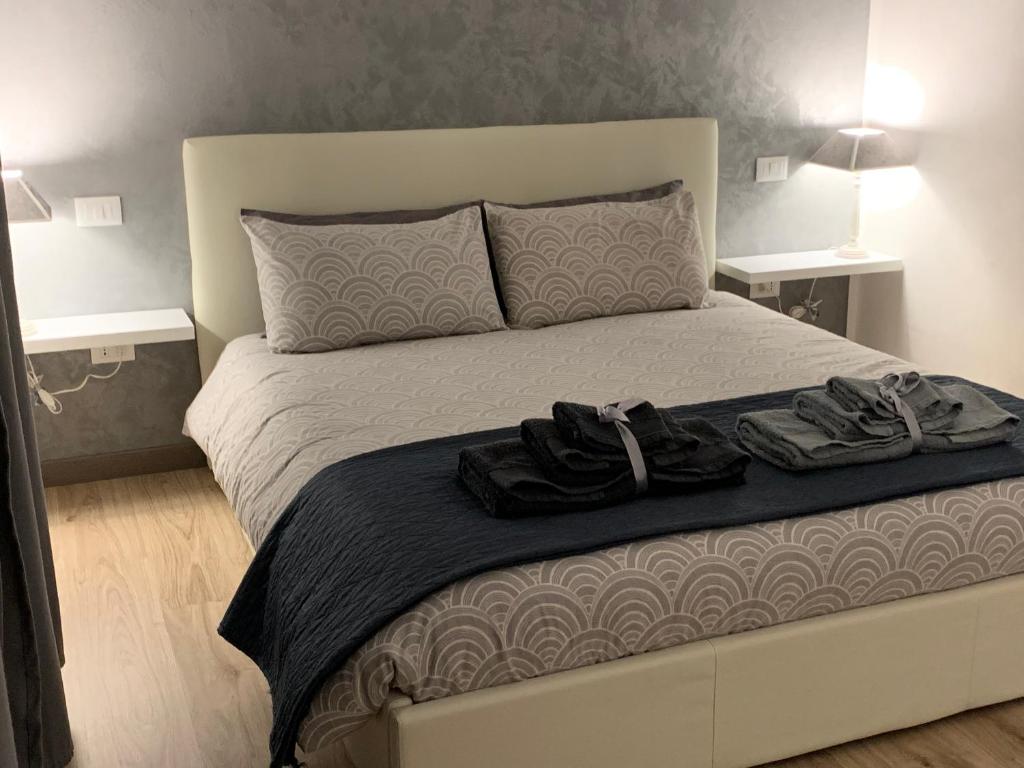 Postel nebo postele na pokoji v ubytování Residenza Guglielmo