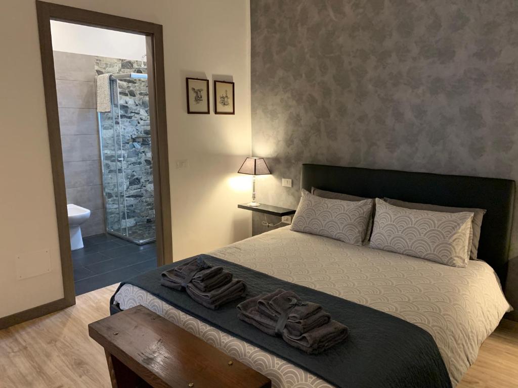 Postel nebo postele na pokoji v ubytování Residenza Guglielmo