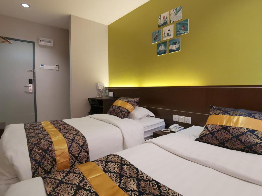 Katil atau katil-katil dalam bilik di Star Bay Hotel