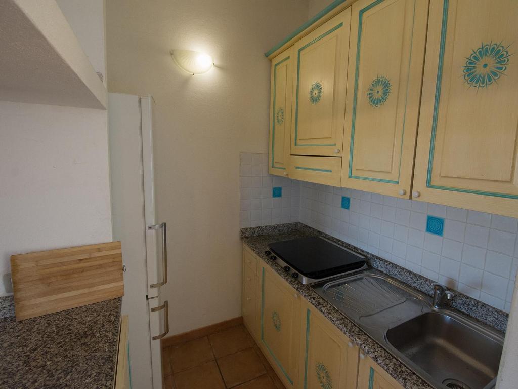 Kuchyň nebo kuchyňský kout v ubytování Residence Cala Petralana