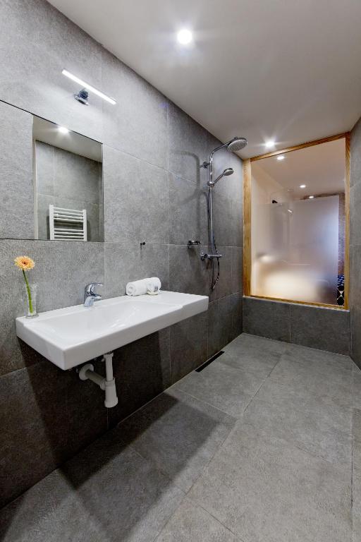 Koupelna v ubytování Hotel Wolf