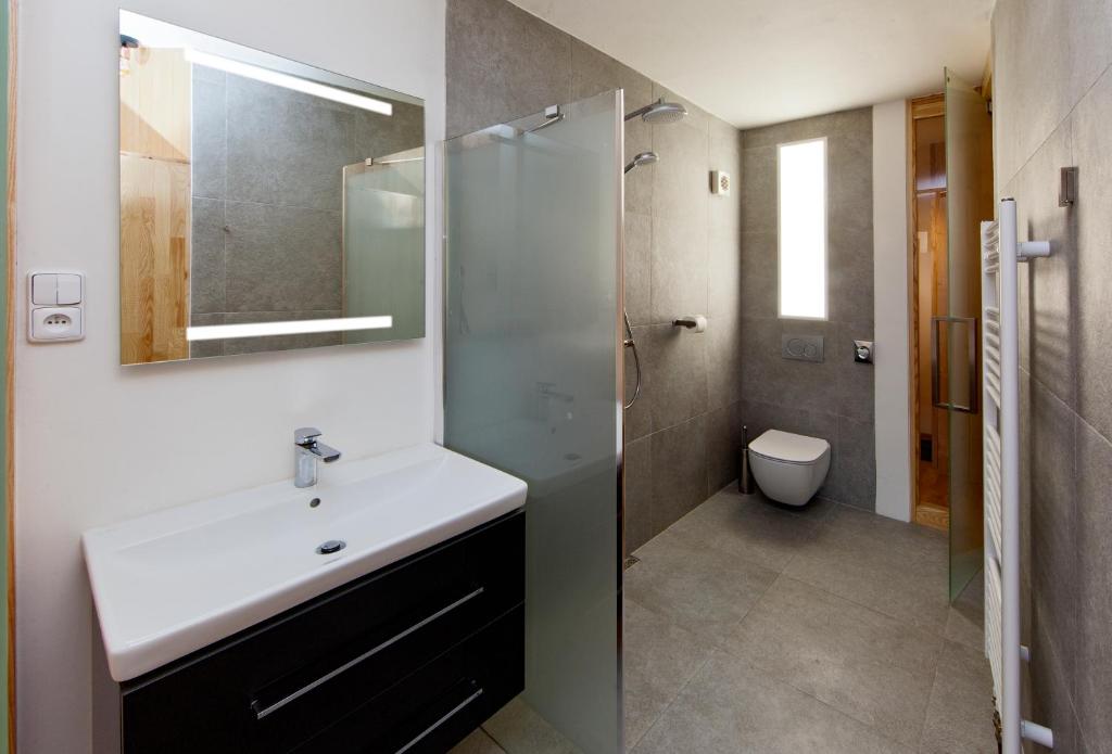 Koupelna v ubytování Hotel Wolf