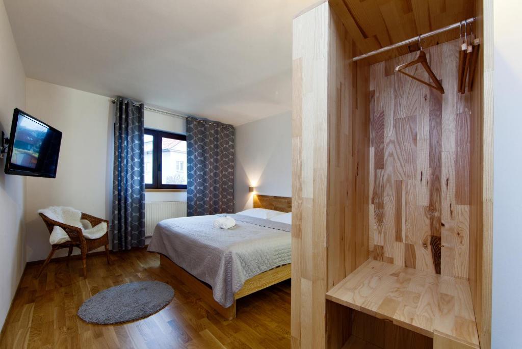 Postel nebo postele na pokoji v ubytování Hotel Wolf