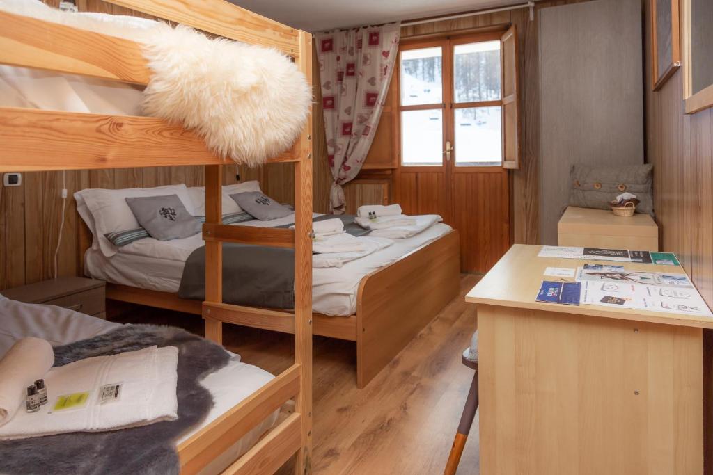 Postel nebo postele na pokoji v ubytování Hotel Monte Triplex