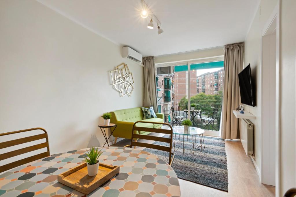 Televízia a/alebo spoločenská miestnosť v ubytovaní Tendency Apartments Forum 4