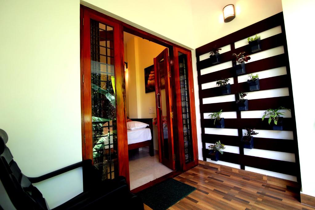 Nirrvaan homestay - Deluxe Doppelzimmer (2 Erwachsene + 1 Kind)