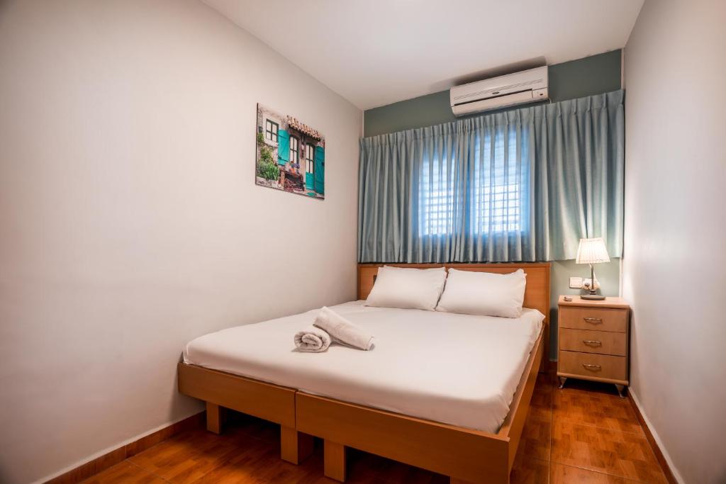 Postel nebo postele na pokoji v ubytování Avital Hotel