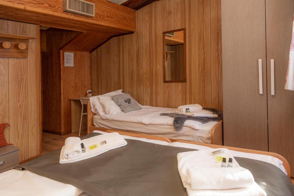 Postel nebo postele na pokoji v ubytování Hotel Monte Triplex