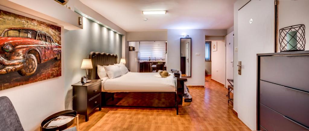 Postel nebo postele na pokoji v ubytování Avital Hotel