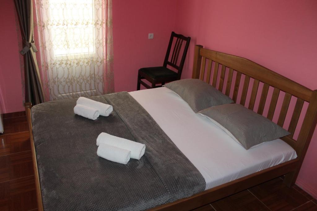 Postel nebo postele na pokoji v ubytování Tornado Hotel