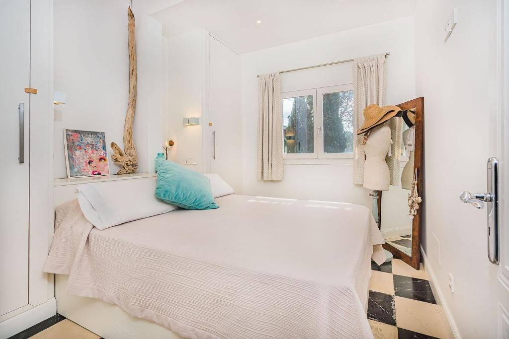 A bed or beds in a room at Beachfront Villa Es Clot by Sealand Villas