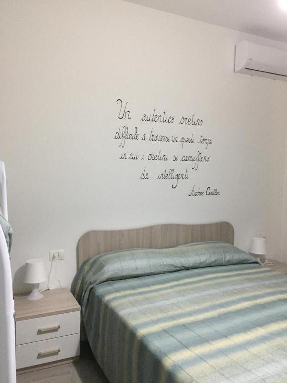 Postel nebo postele na pokoji v ubytování B&b villa Arena
