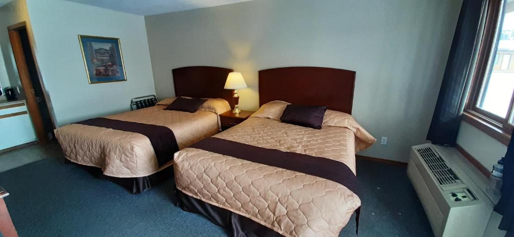 Postel nebo postele na pokoji v ubytování Mary's Motel
