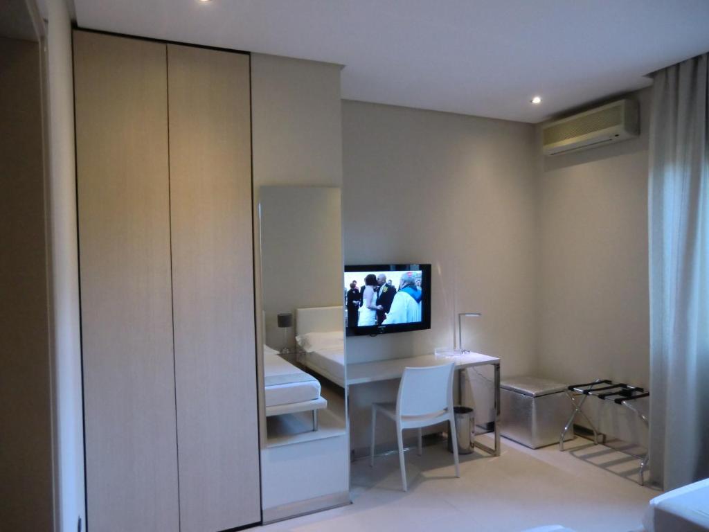 TV a/nebo společenská místnost v ubytování B&Beach Cagliari guest house