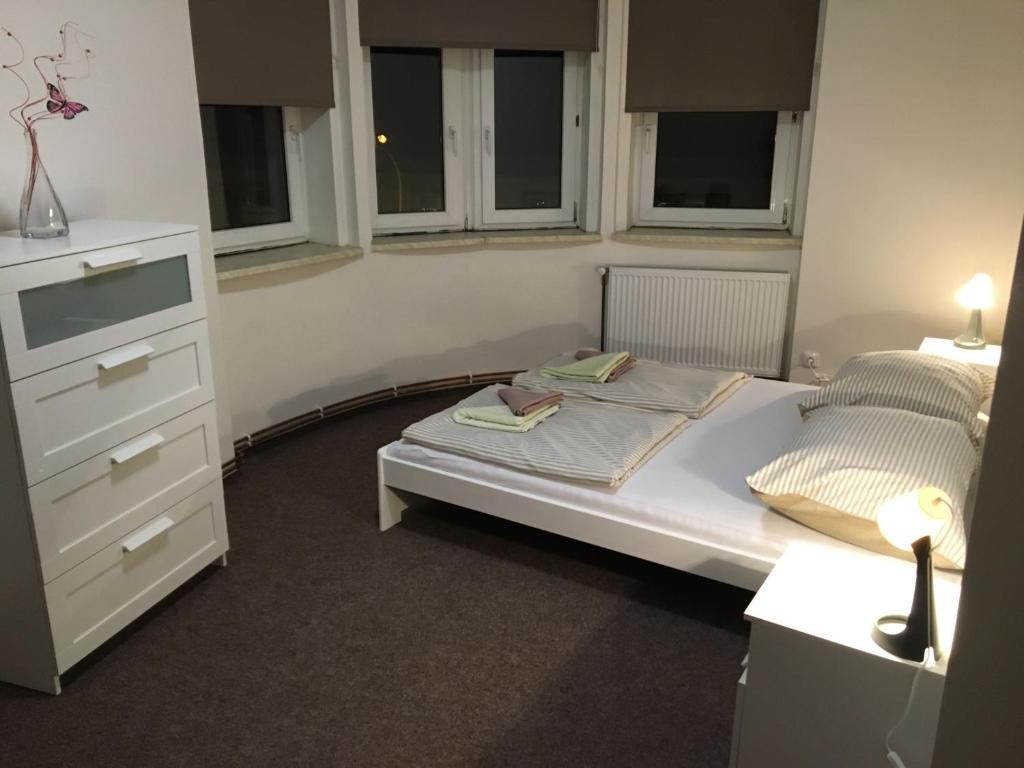Letto o letti in una camera di Apartmány U Muzea