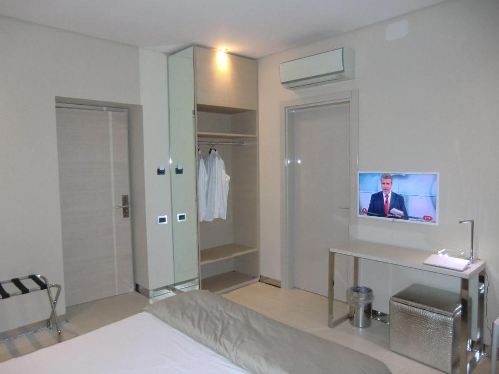 TV a/nebo společenská místnost v ubytování B&Beach Cagliari guest house