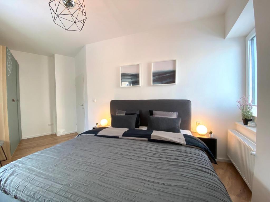 Posteľ alebo postele v izbe v ubytovaní White Inn - Ferienwohnung mit Terrasse