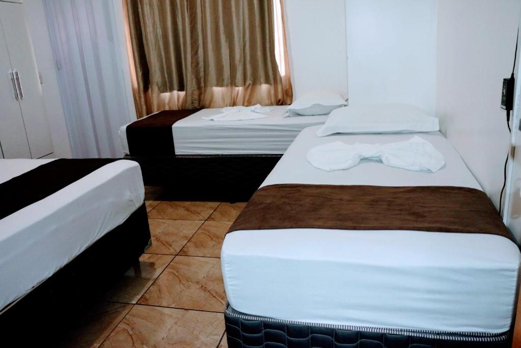 Postel nebo postele na pokoji v ubytování Hotel Edinik