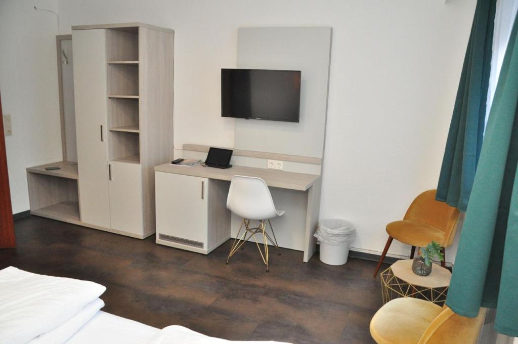 TV a/nebo společenská místnost v ubytování Hotel Am Martinsberg